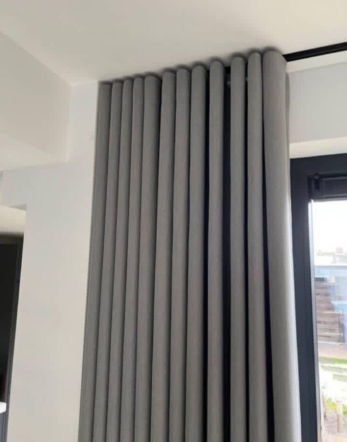 Detailed grey curtain installation